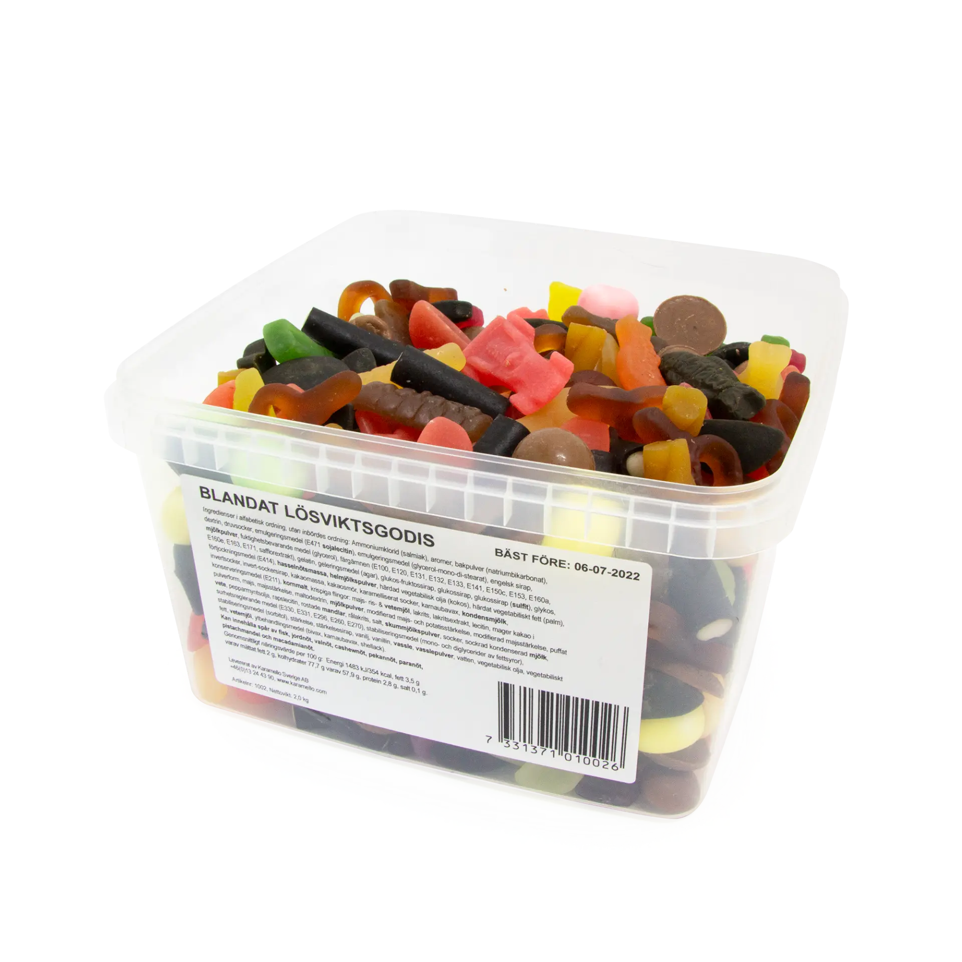 Blandat oinslaget godis i plastburk