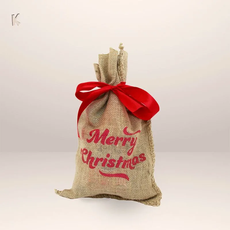 Julsäck jute Merry Christmas mixade godsaker liten